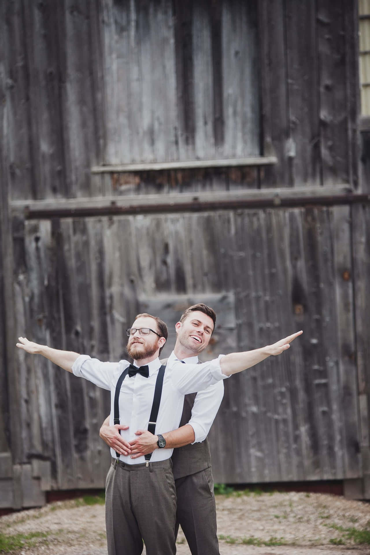A charming newlywed couple with funny expressions on their special day.