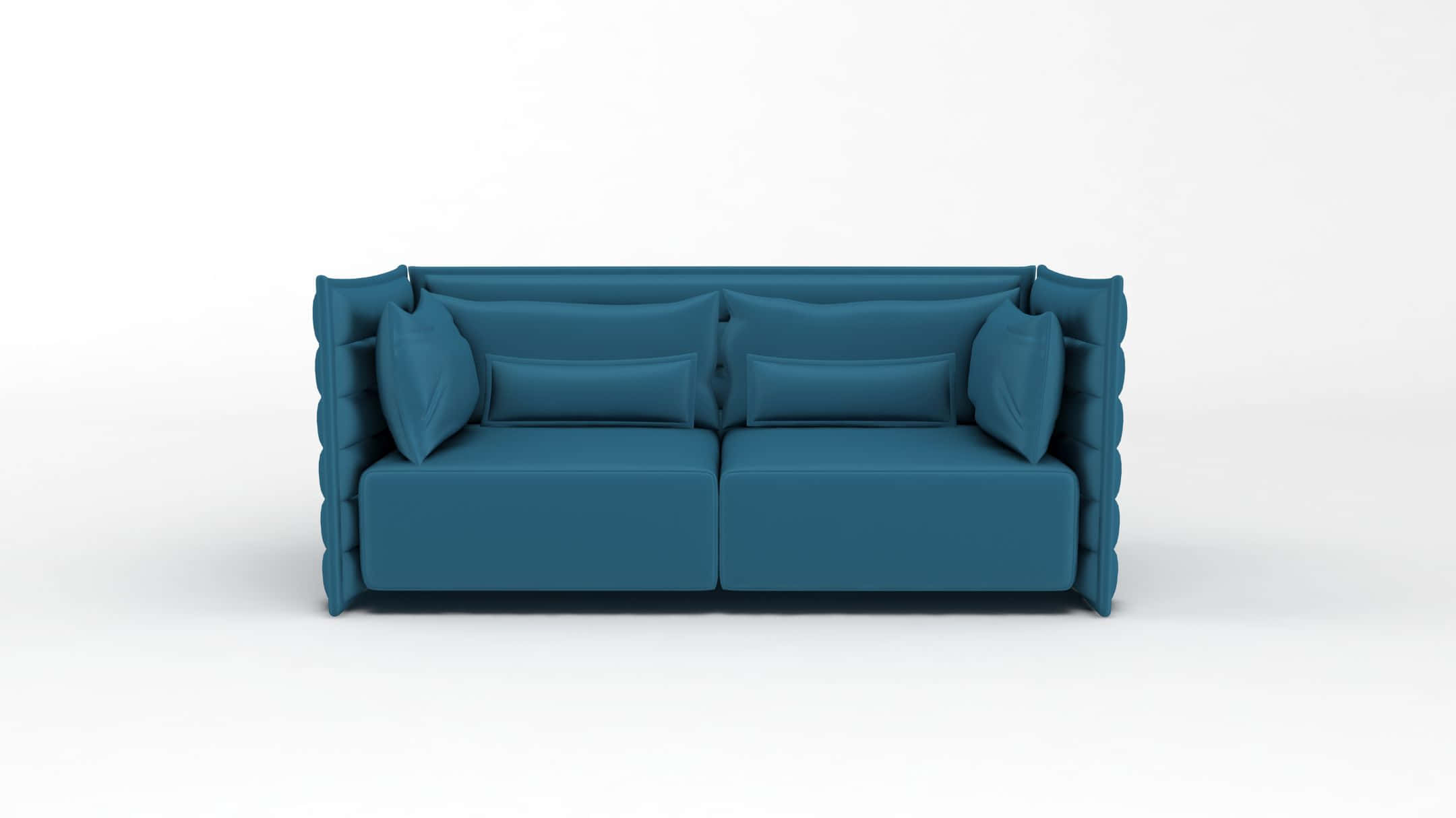 A Blue Sofa With Pillows On It