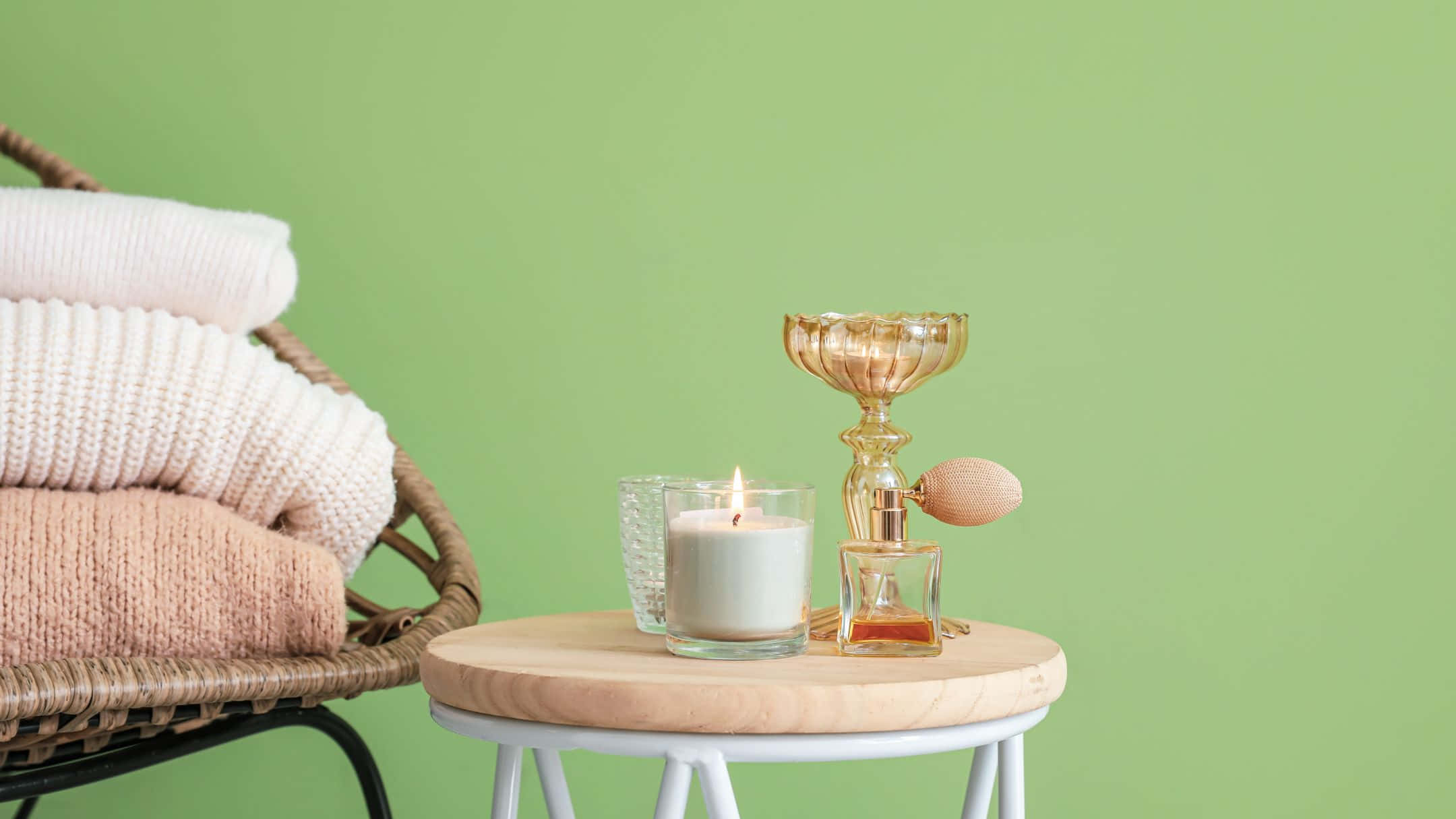 A Wooden Stool With A Candle And A Candlestick