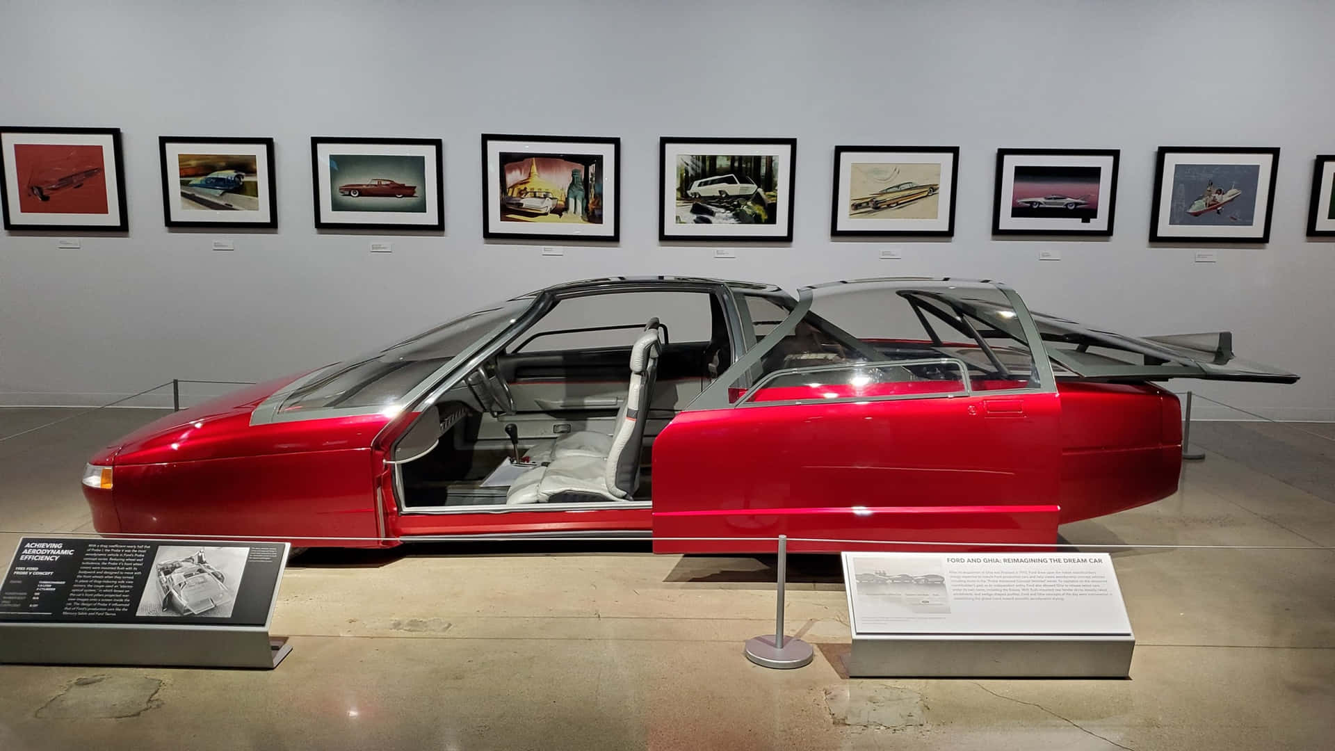 Futuristic Red Car Exhibit Petersen Museum Wallpaper