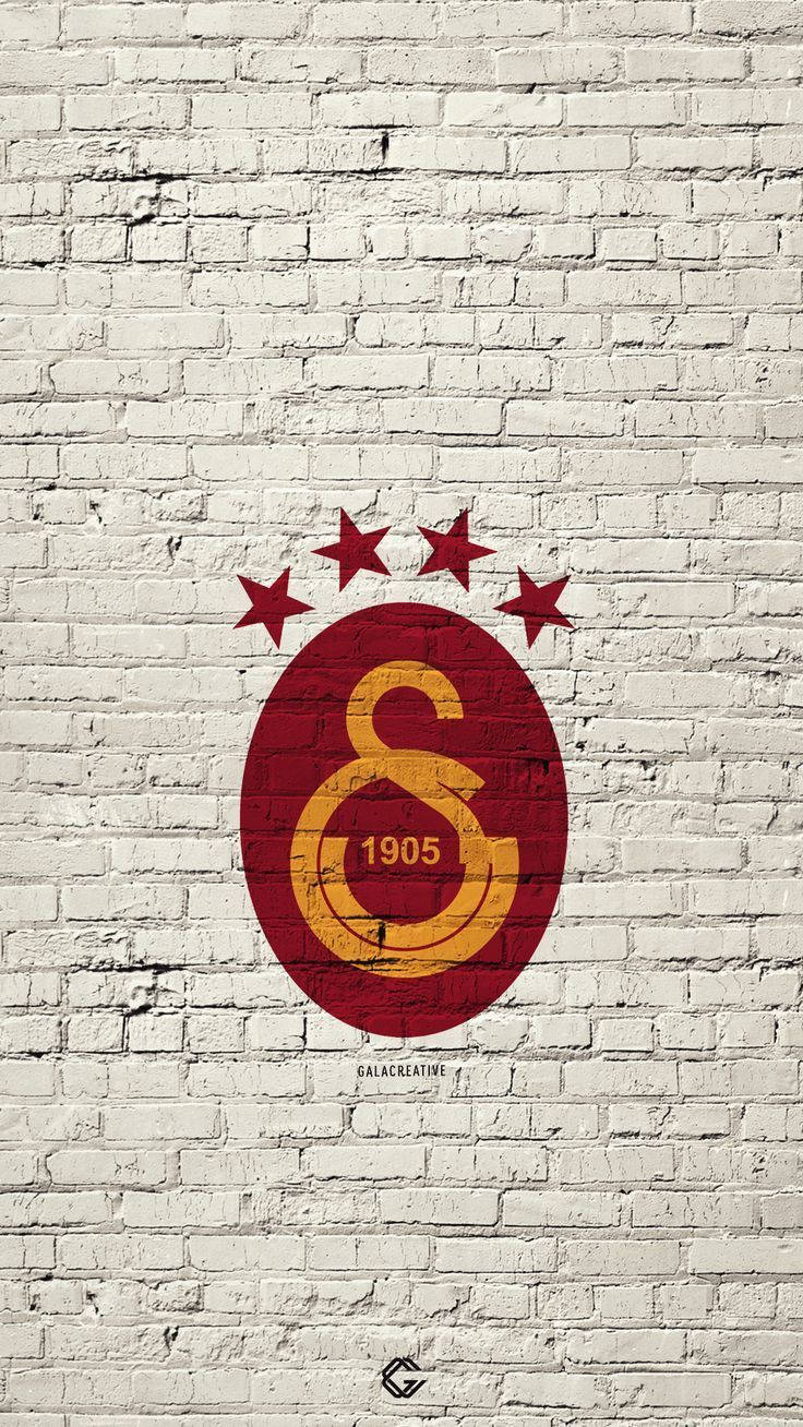 Galatasaray Logo på Hvid Mursten Tapet. Wallpaper