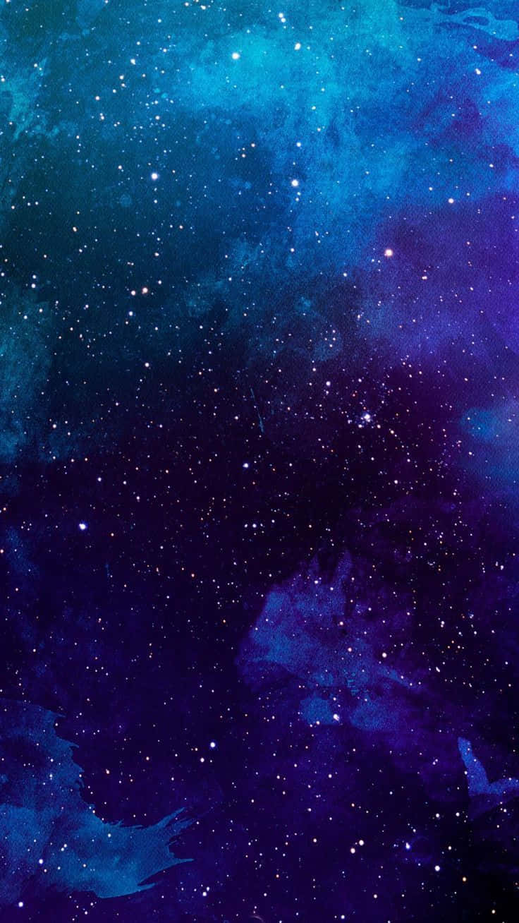 Be mesmerized by the beauty of a starry blue night Wallpaper