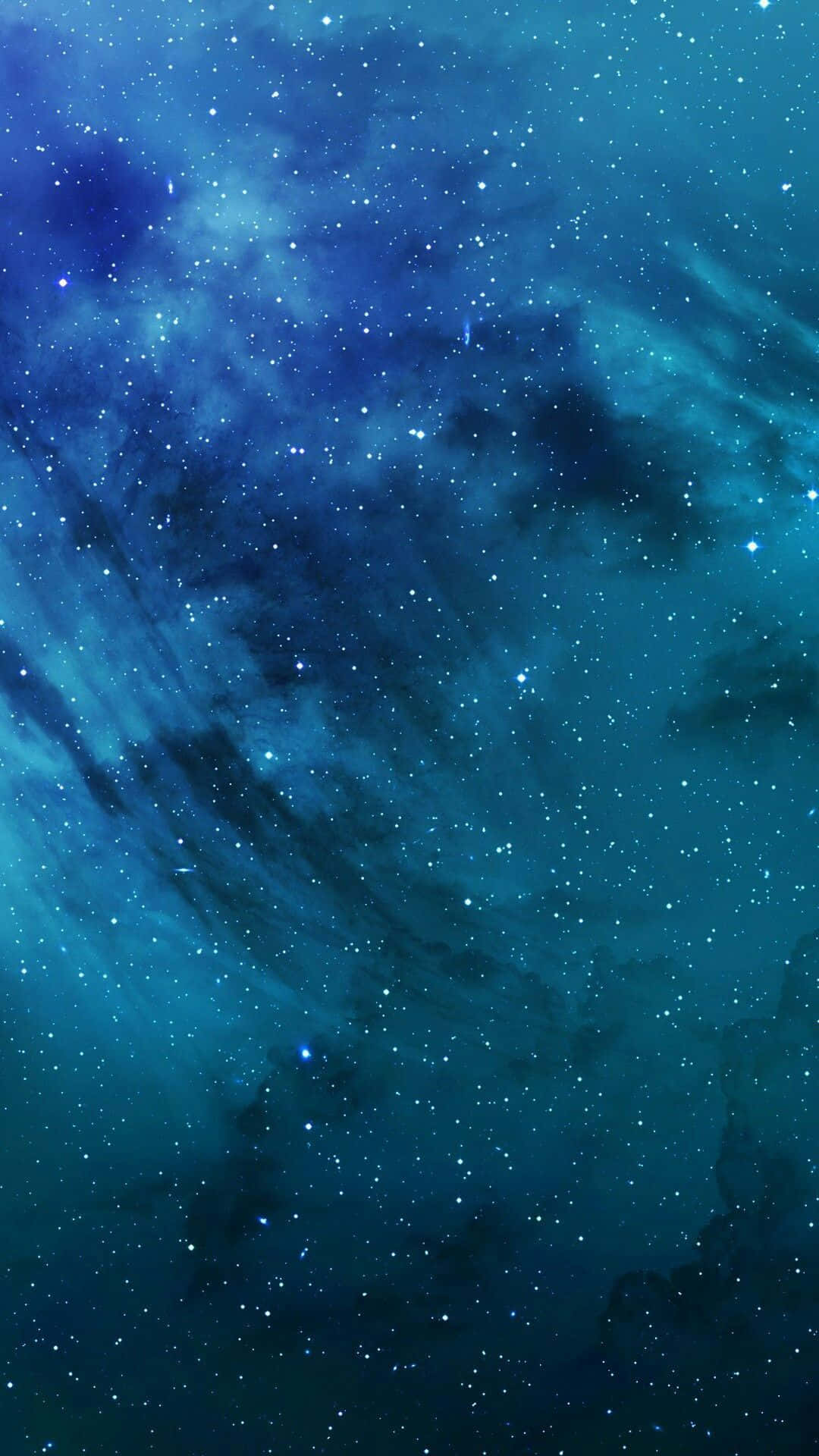 Explore the vastness of an illuminated blue galaxy Wallpaper
