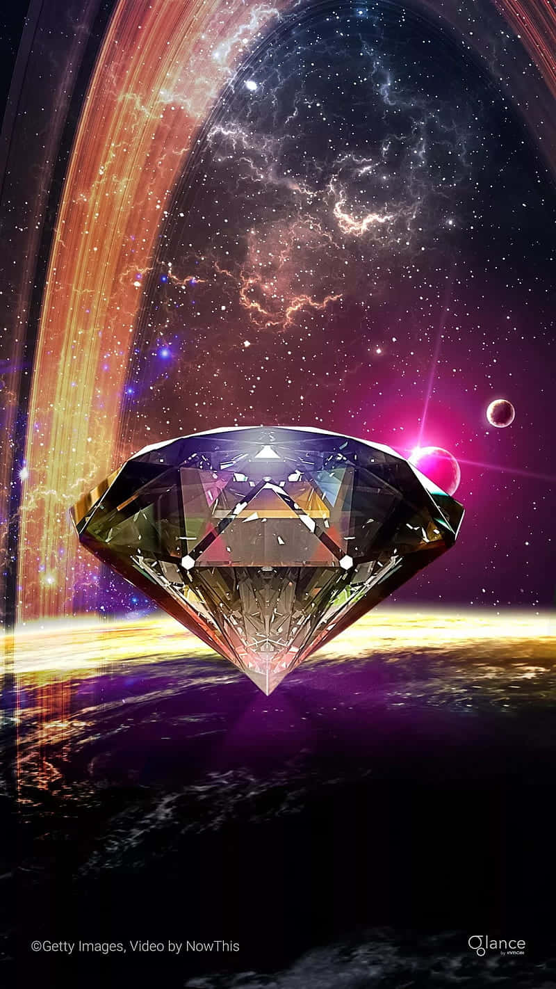 A Diamond In Space With A Galaxy In The Background Wallpaper