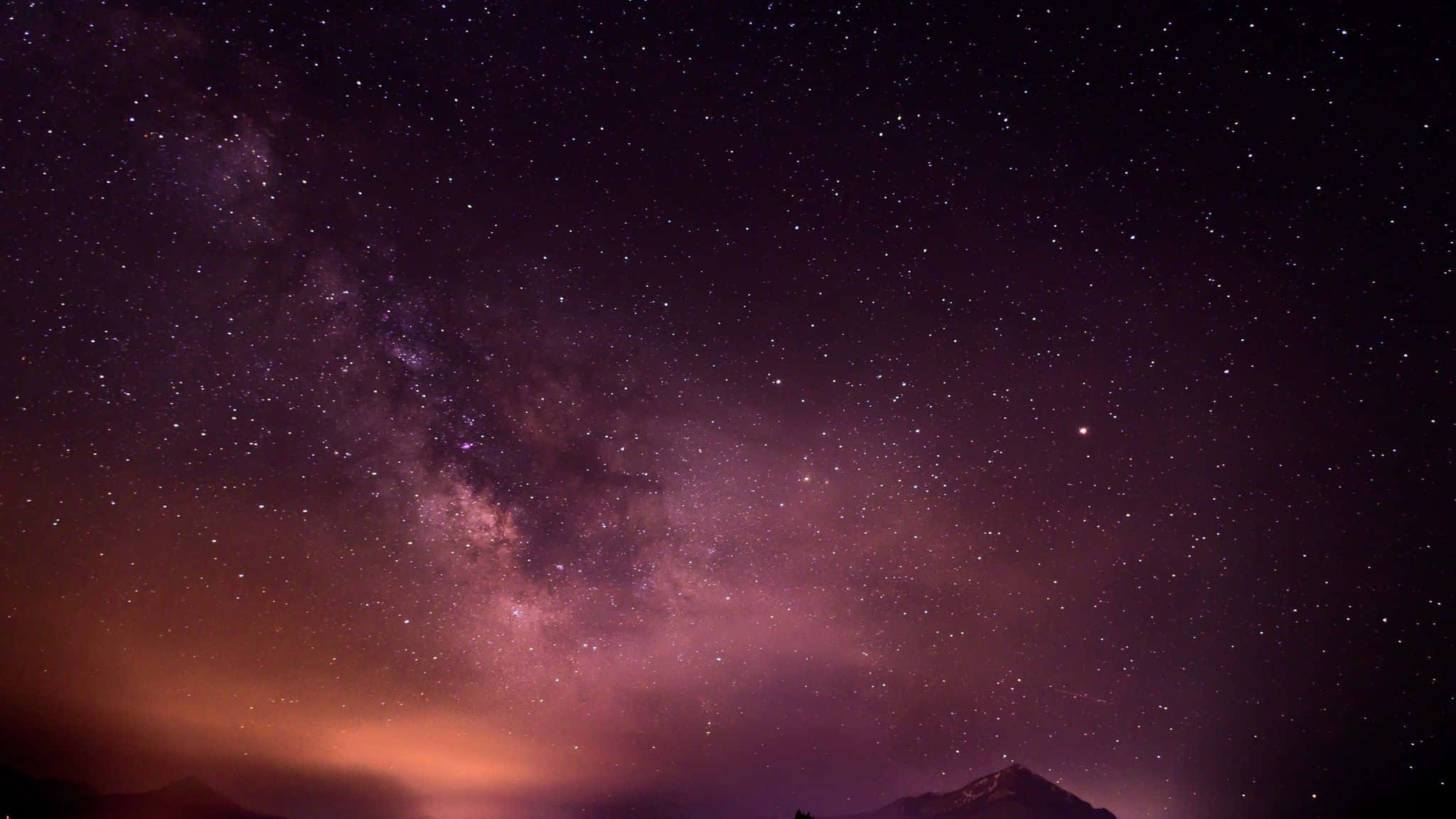 Explore a different galaxy filled with stars" Wallpaper