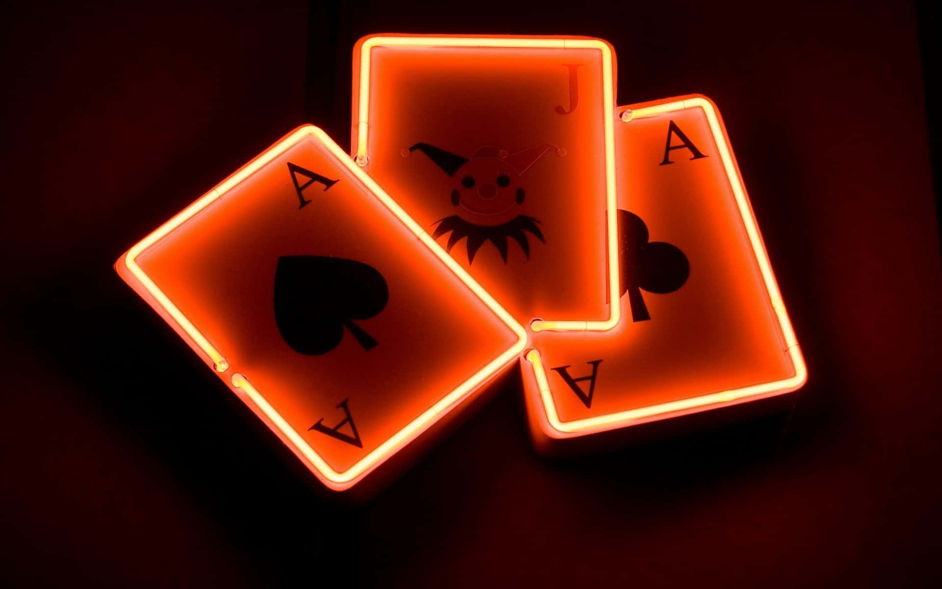 Neon Playing Cards With A Red Light