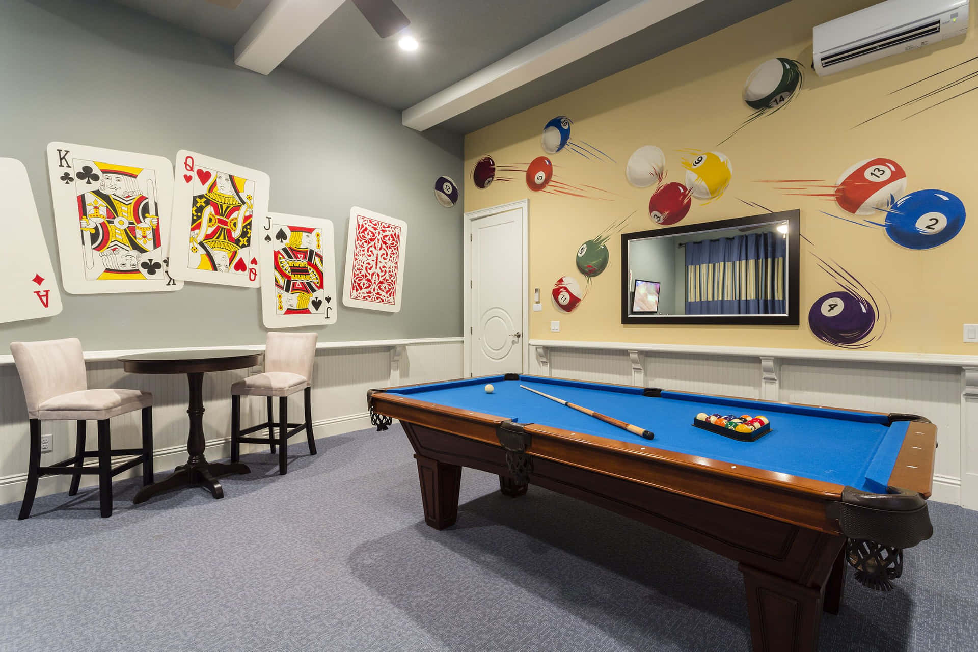 A Pool Table And A Bar In A Room