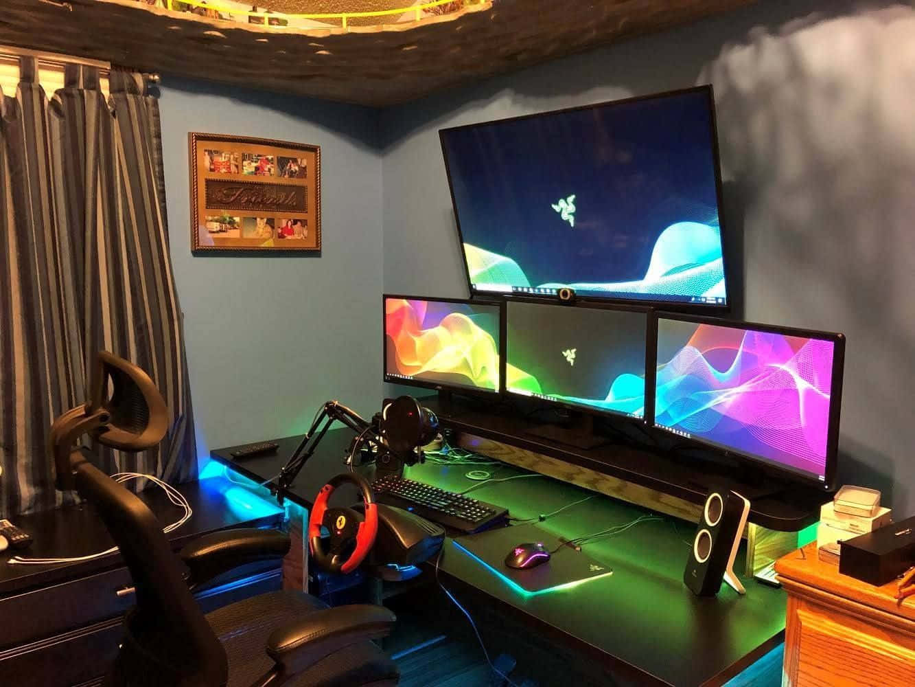 A Gaming Room With A Monitor And A Chair