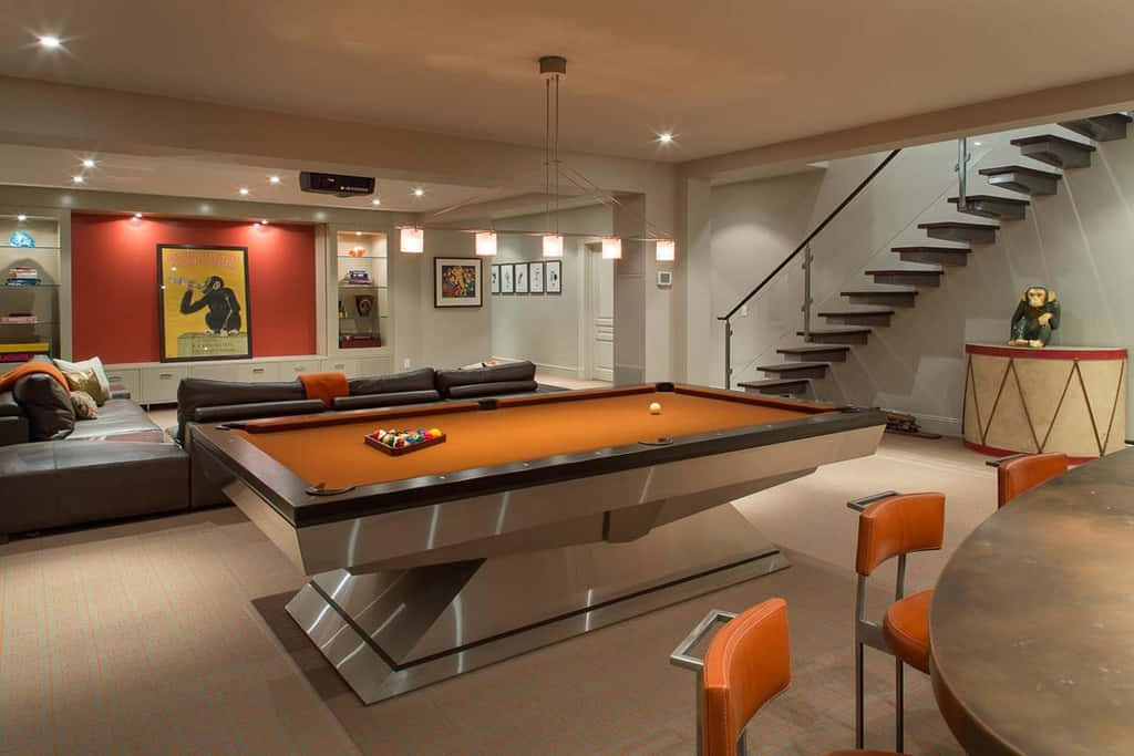 A Basement With A Pool Table And A Staircase