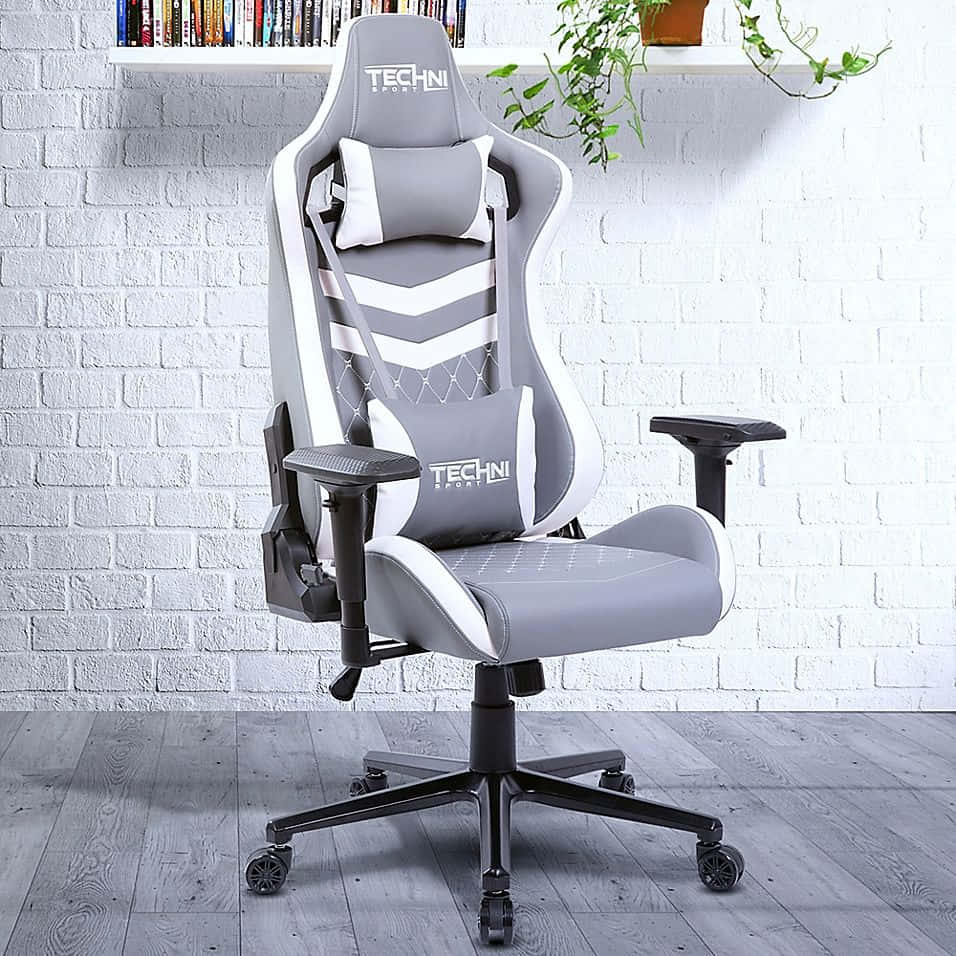 Get ready to level up your gaming experience with the ultimate gaming chair Wallpaper