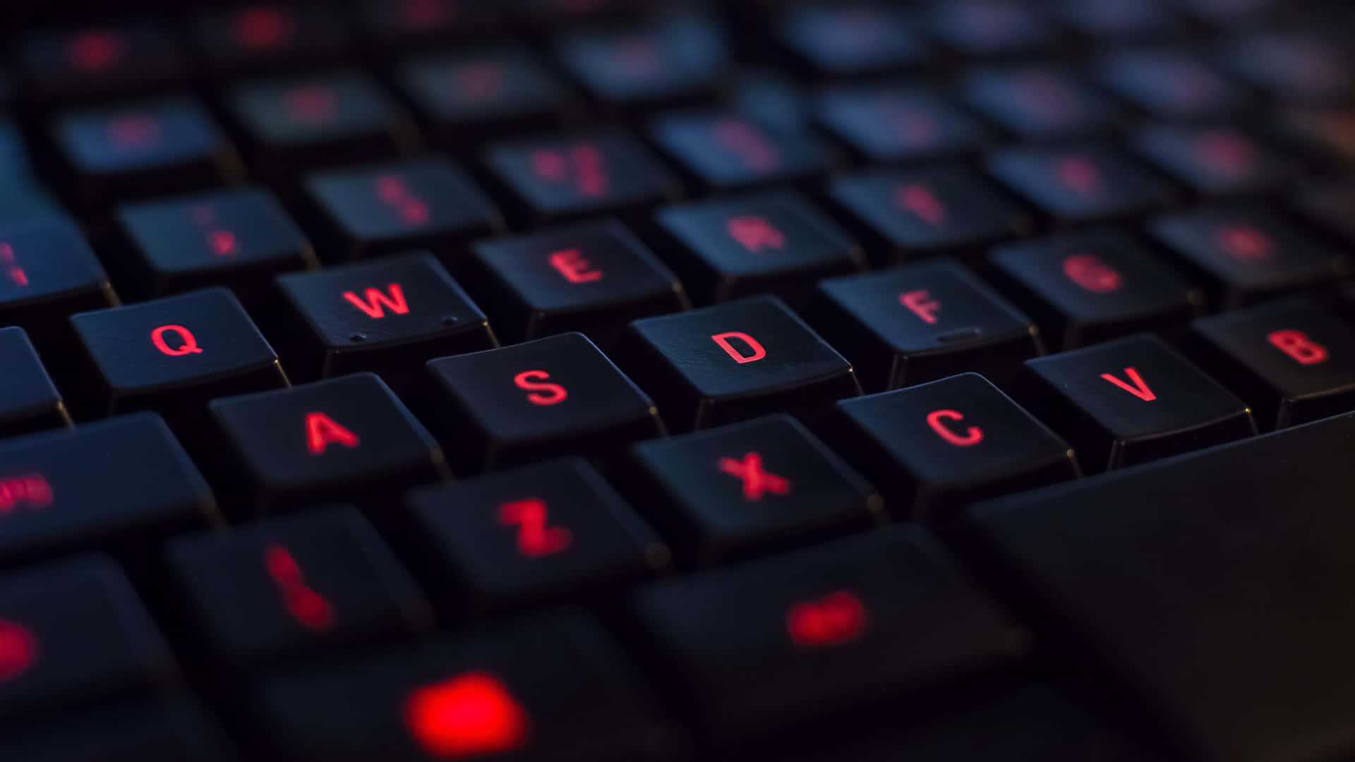 Play your favorite game with style using the best gaming keyboards Wallpaper