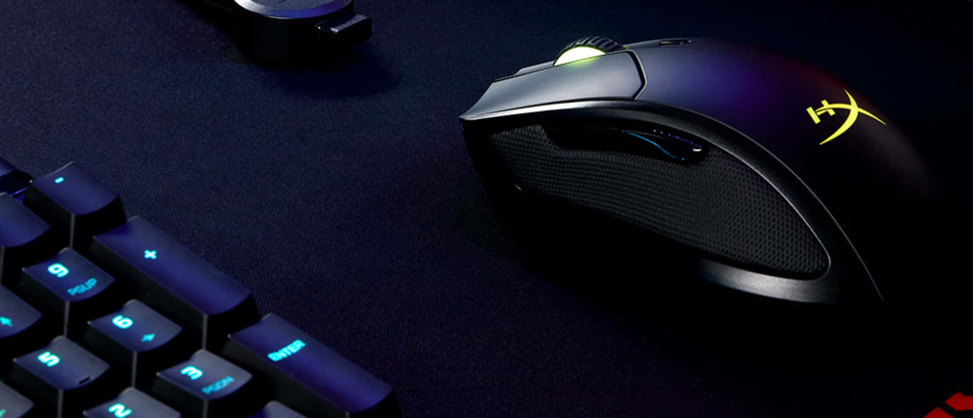 Enhanced Gaming Experience with RGB Gaming Mouse Wallpaper