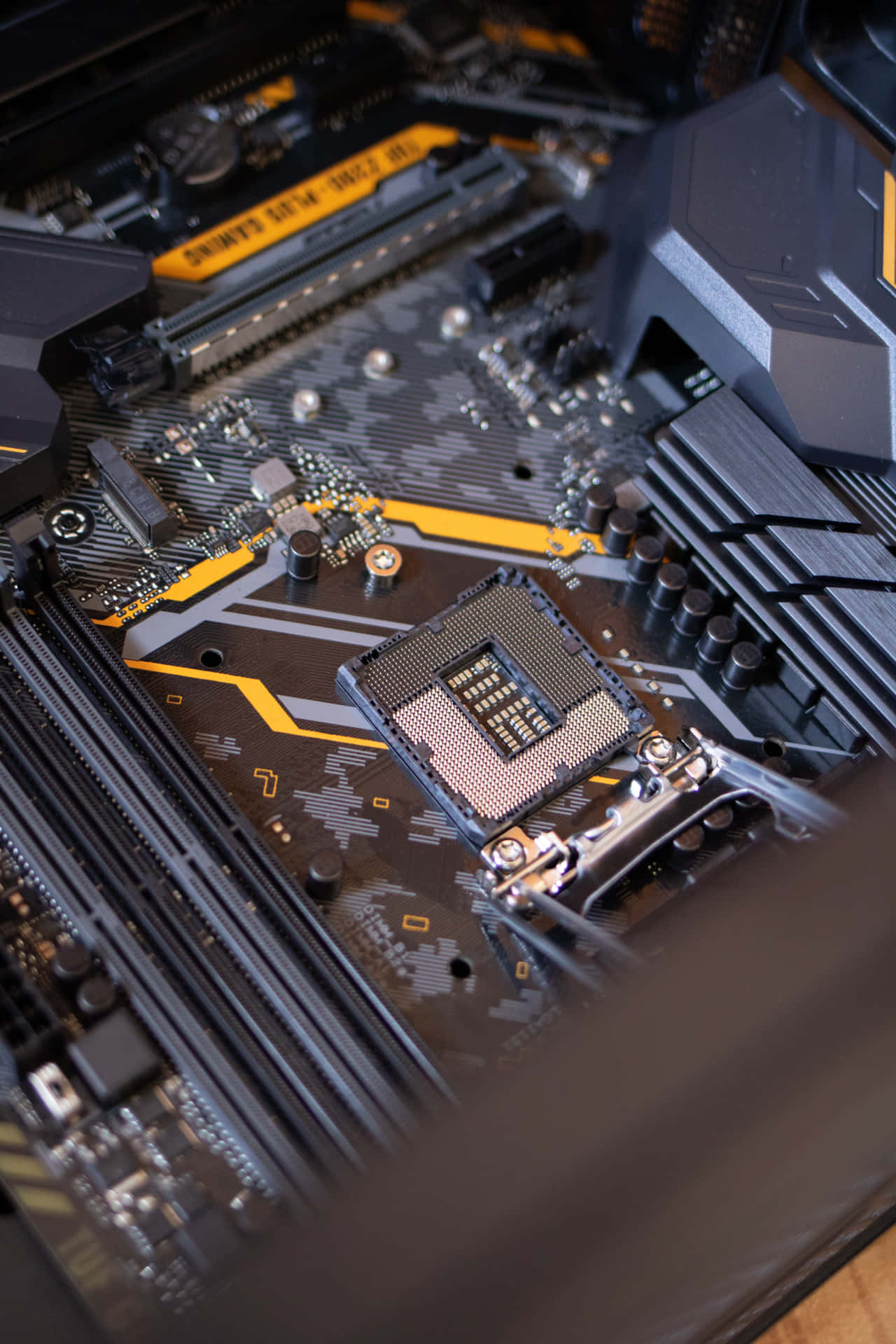 A Close Up Of A Motherboard With A Cpu And Ram