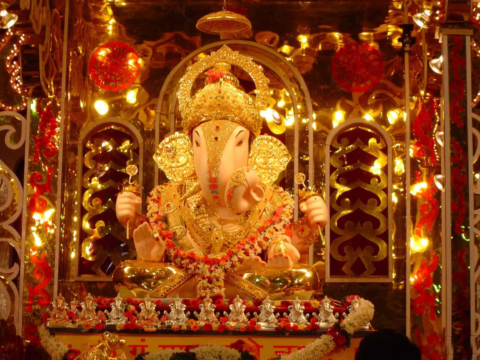 Ganesh Idol In A Temple With Lights