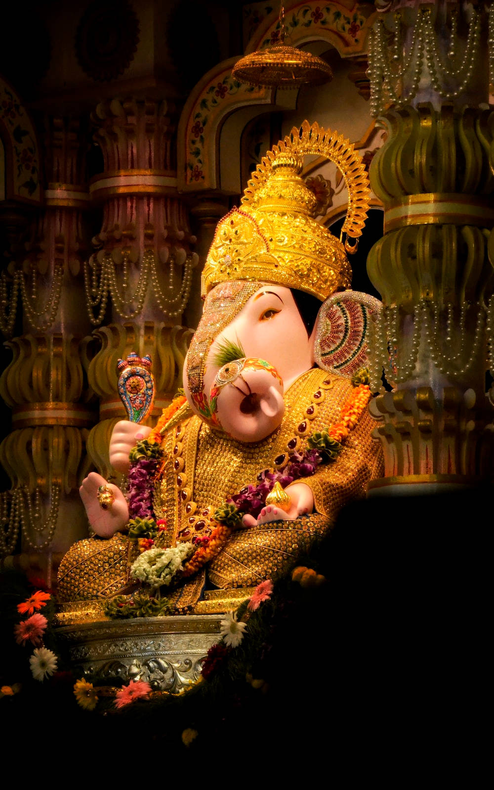 Download Ganesha Surrounded With Gold Wallpaper | Wallpapers.com