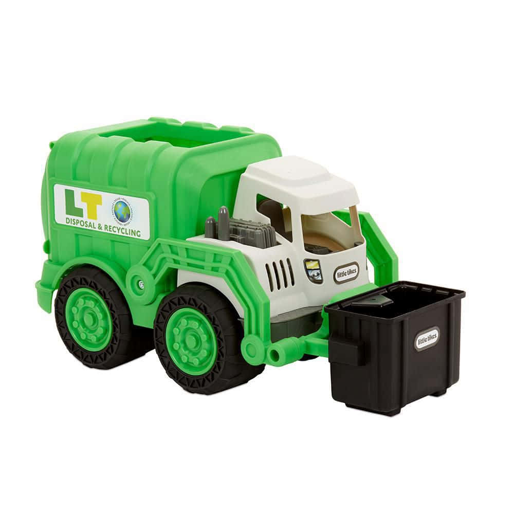 A Green Garbage Truck With A Black Trash Can