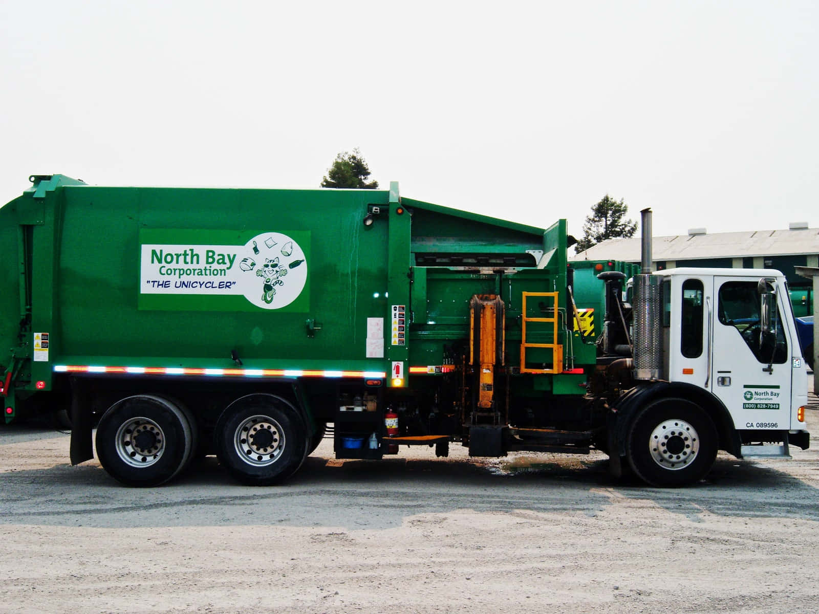 A Green Garbage Truck