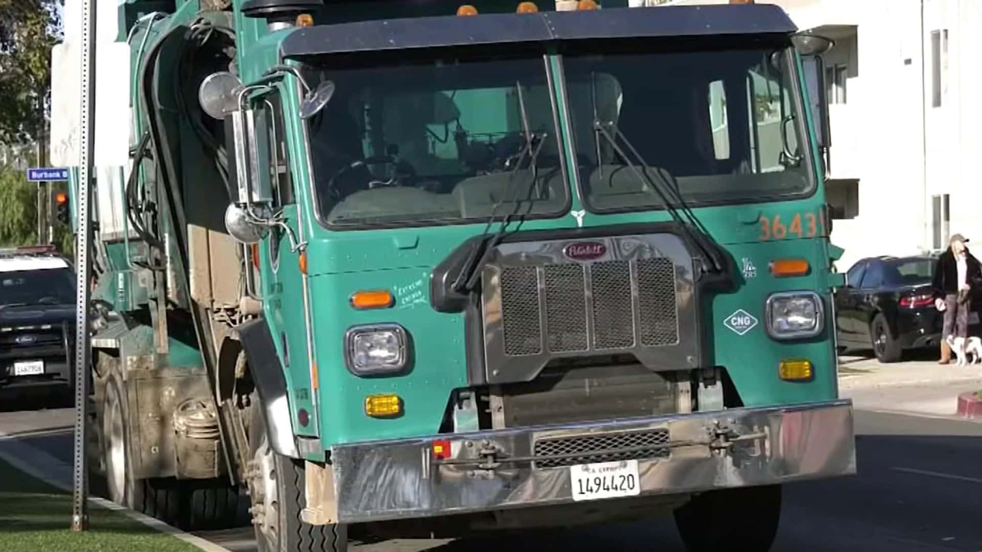 A recycling garbage truck — doing its part for the environment!