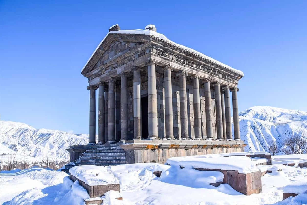 Garni Temple Covered In Snow Wallpaper