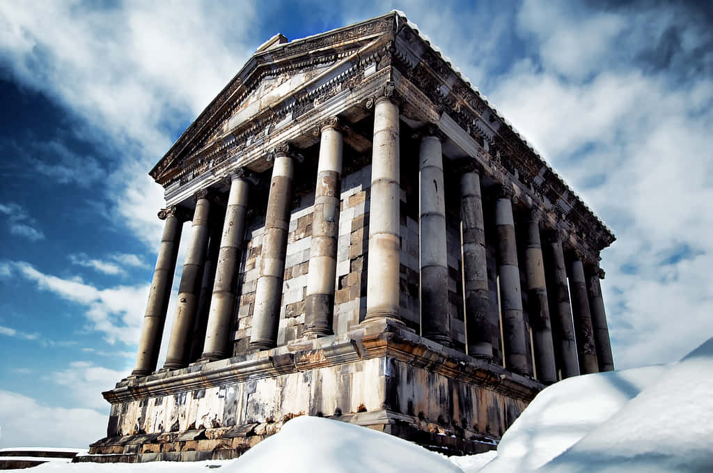 Garni Temple With Blue Sky And Clouds Wallpaper