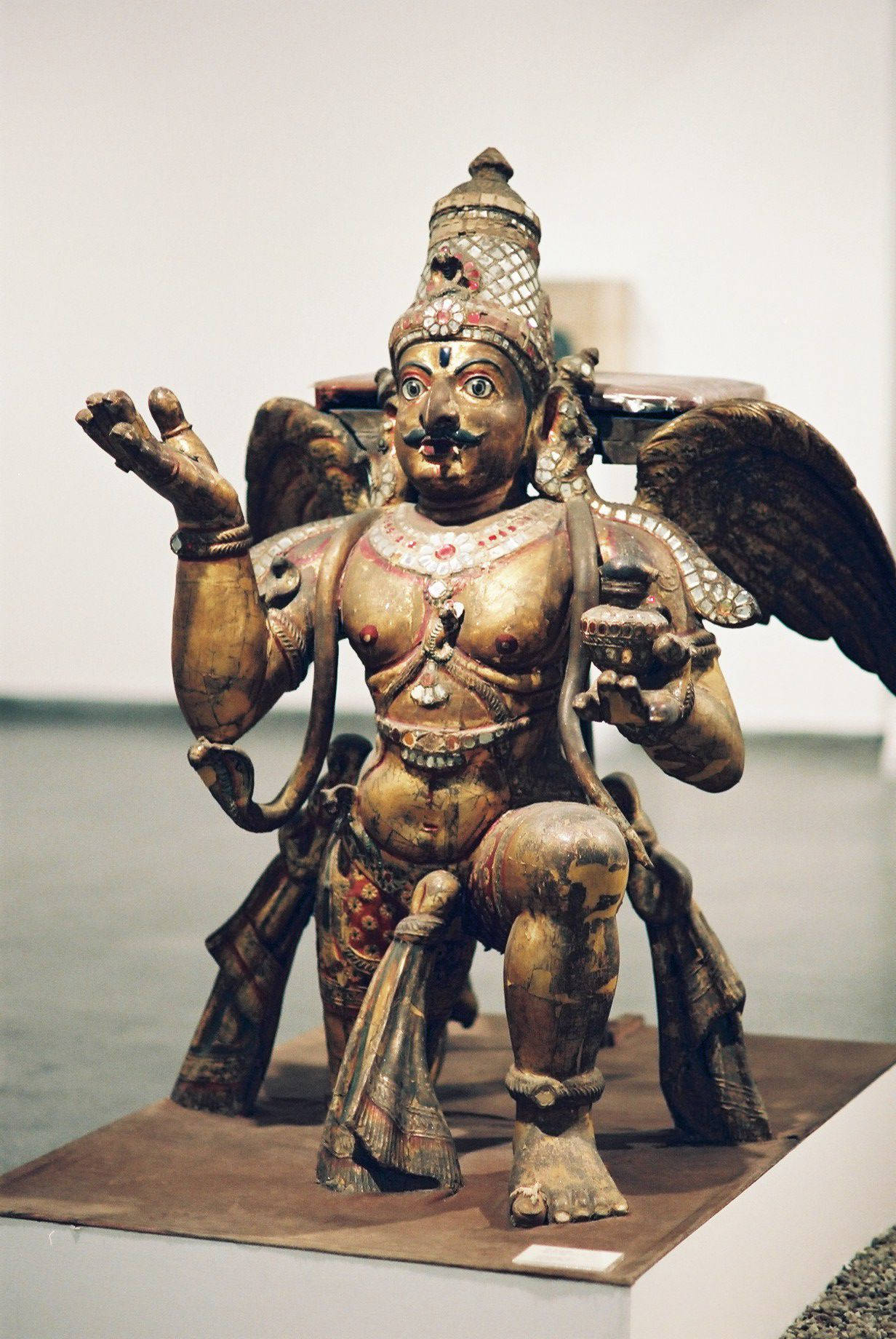 Garuda Statue In Traditional Pose Wallpaper