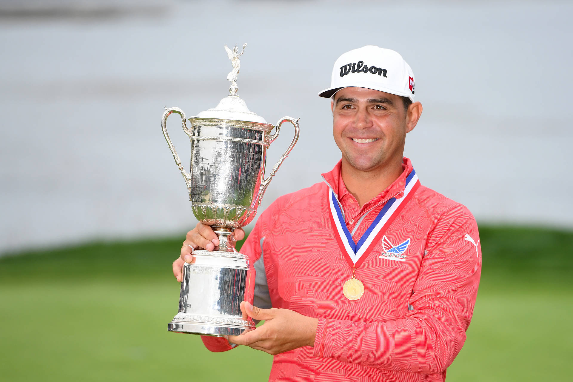 Gary Woodland Holding His Trophy Wallpaper