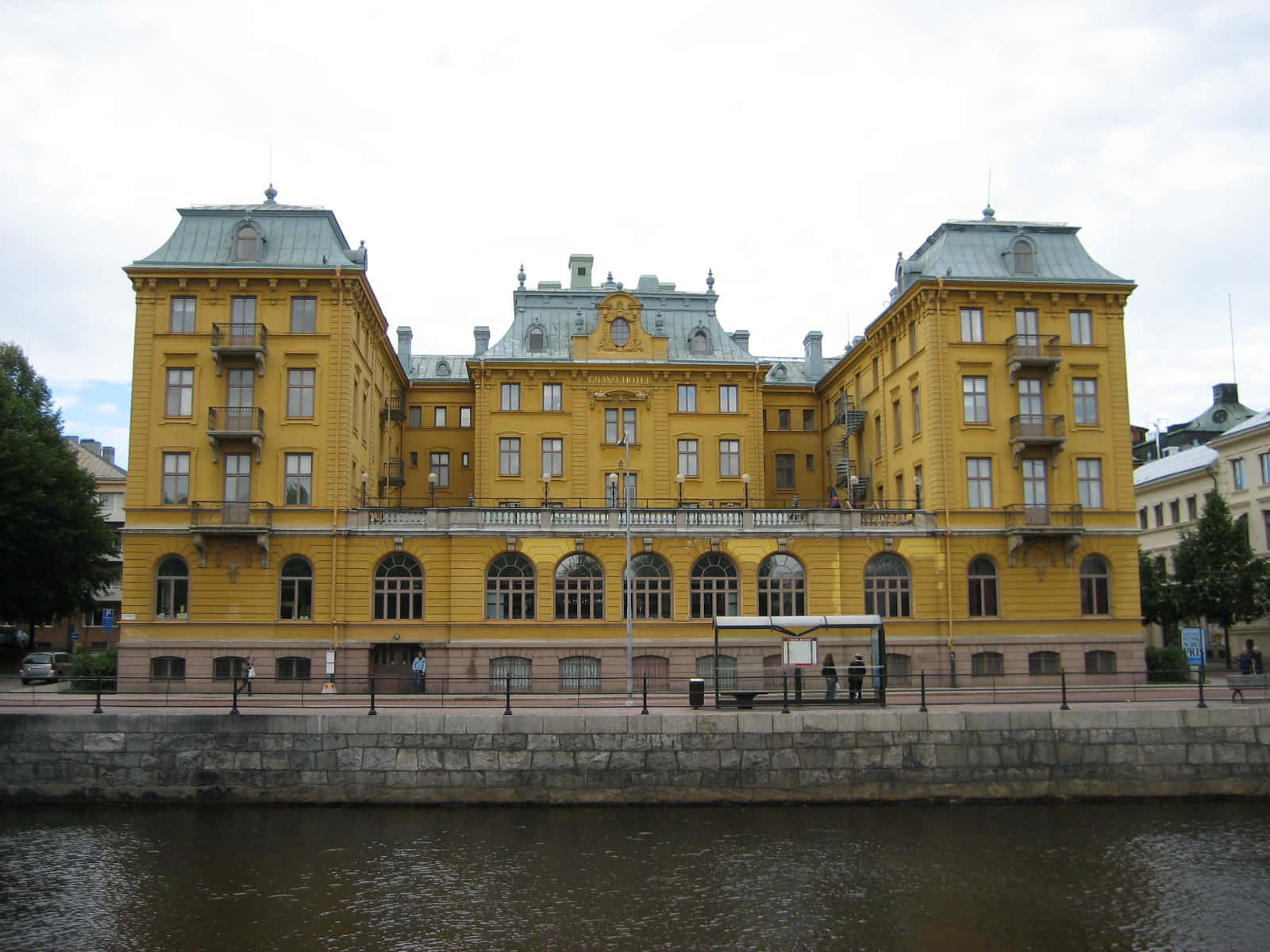 Gavle Riverfront Yellow Building Wallpaper