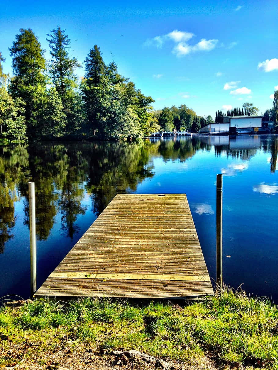 Gavle Serene Lakeside Dock Wallpaper