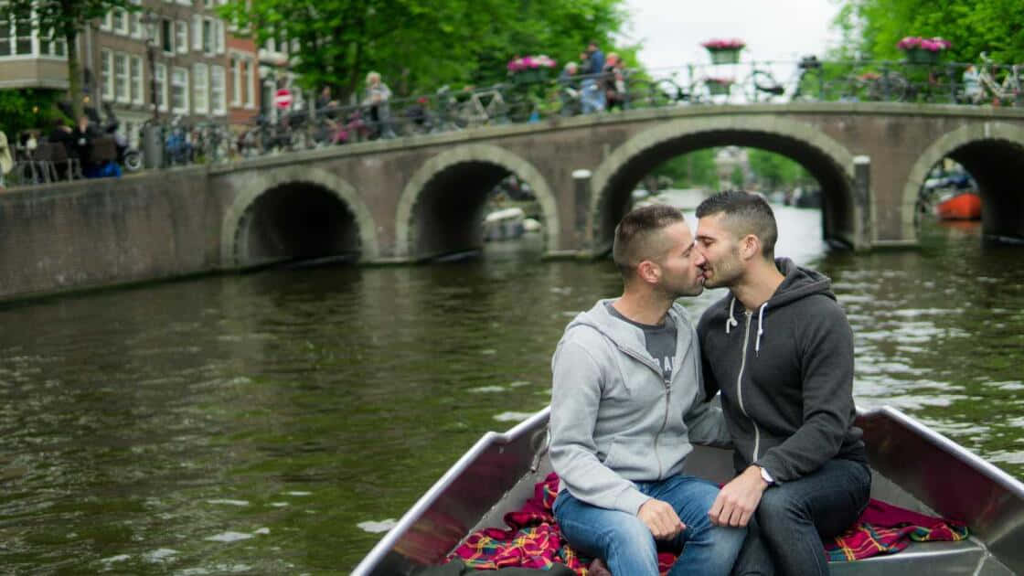 Gay Boys Kissing On A Boat Wallpaper