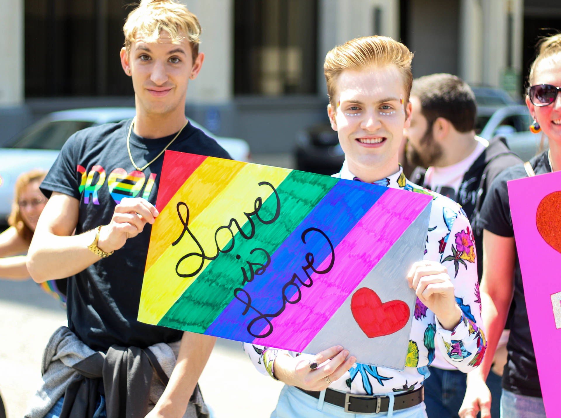 Gay Men Holding Love Sign Background
