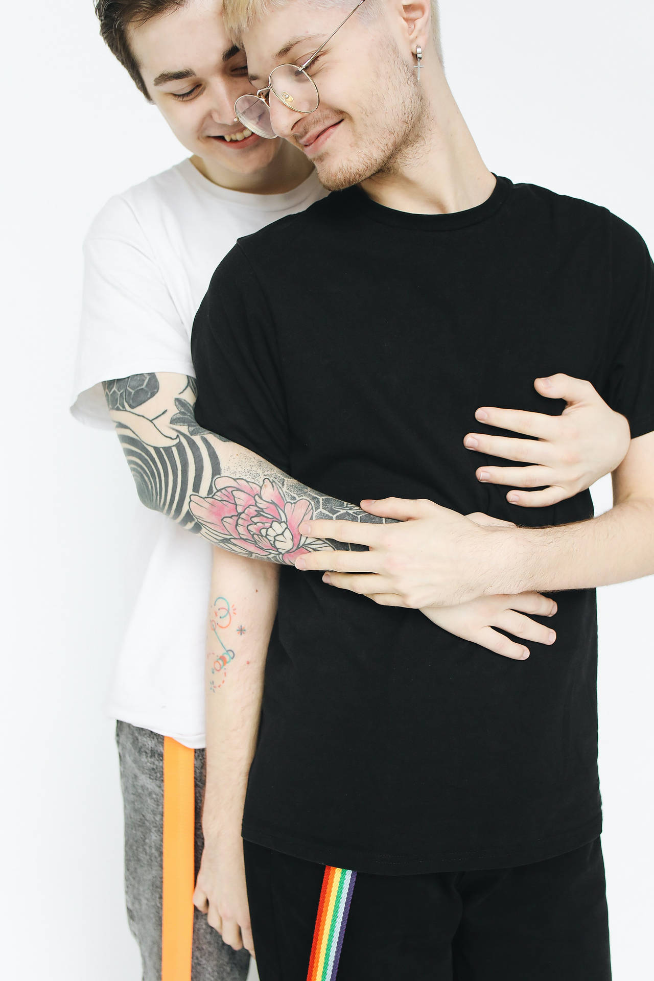 Gay Men Hugging From Behind Wallpaper