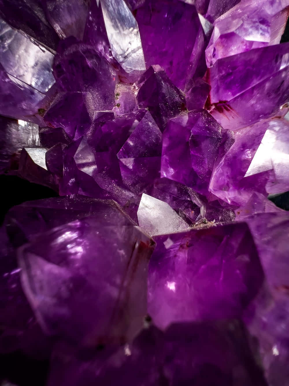 Purple Crystals On A Black Background