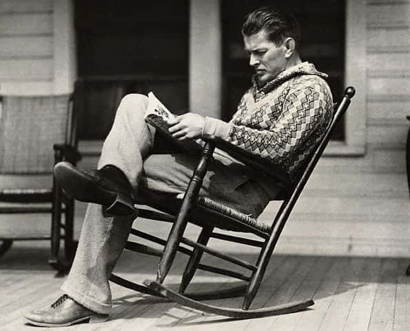 Gene Tunney Sitting On A Rocking Chair Wallpaper