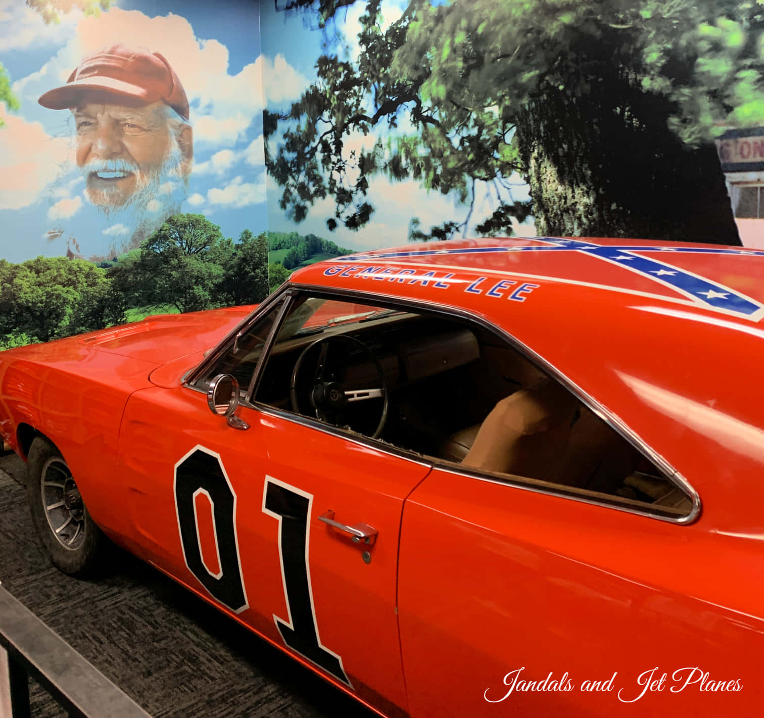 Cruise with style in the legendary General Lee car from the classic TV show "The Dukes of Hazzard". Wallpaper
