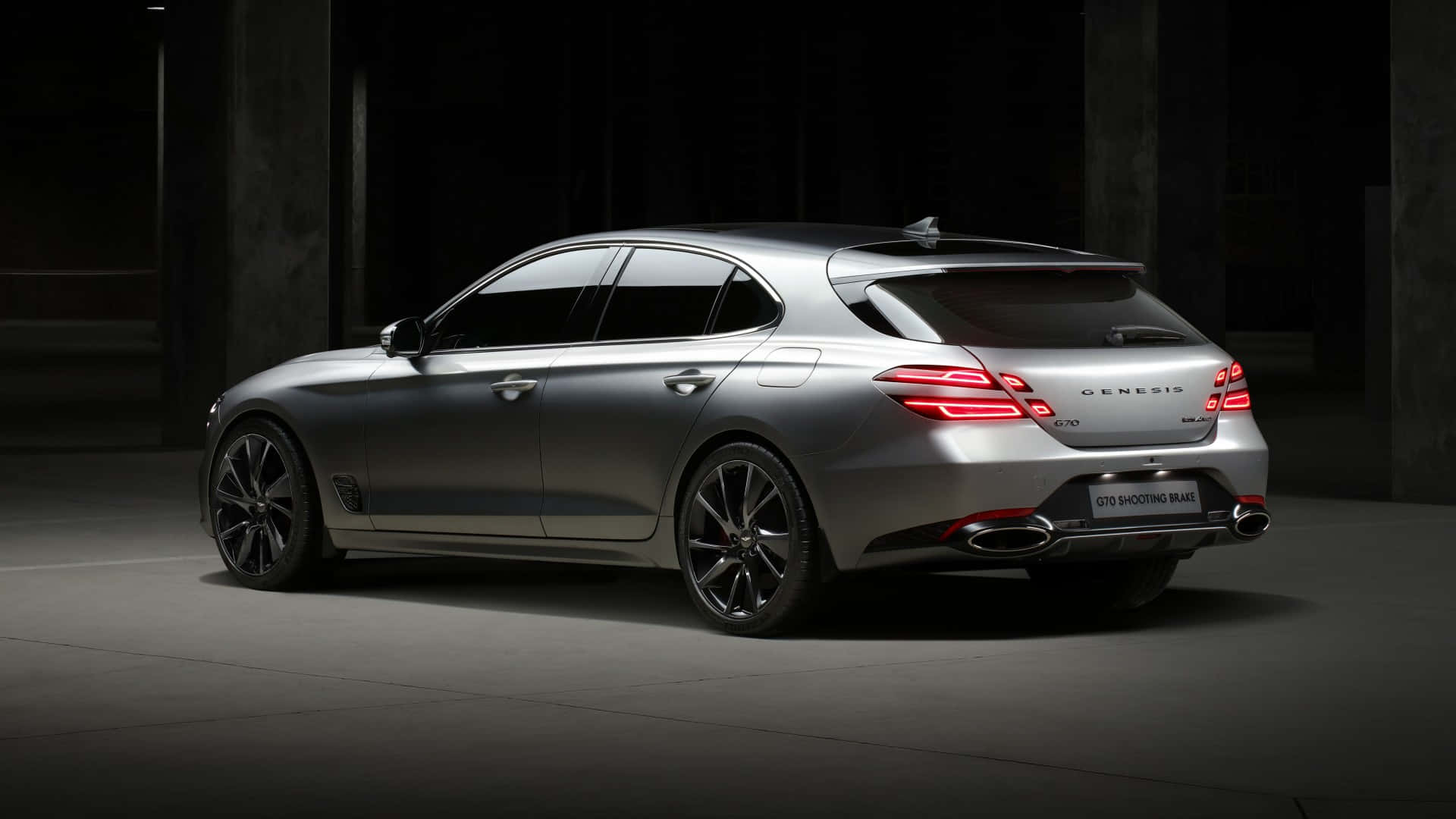 Sleek Genesis G70 in Motion on the Road Wallpaper