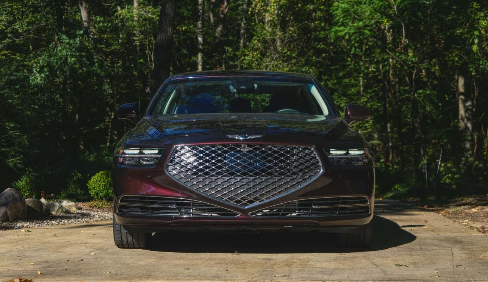 Stunning Genesis G90 Luxury Sedan in a Beautiful Outdoor Setting Wallpaper