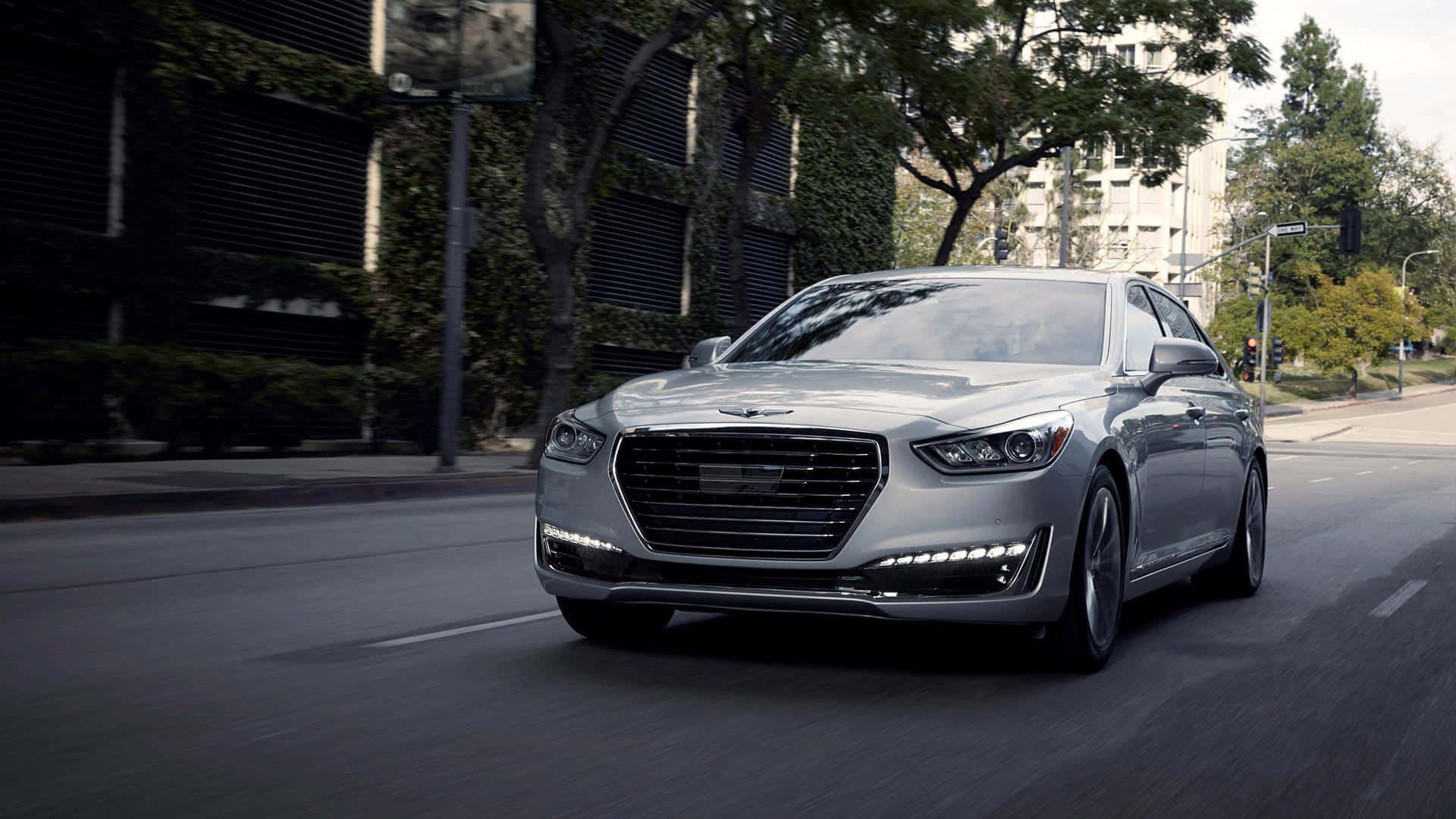 Sleek and Elegant Genesis G90 on the Road Wallpaper