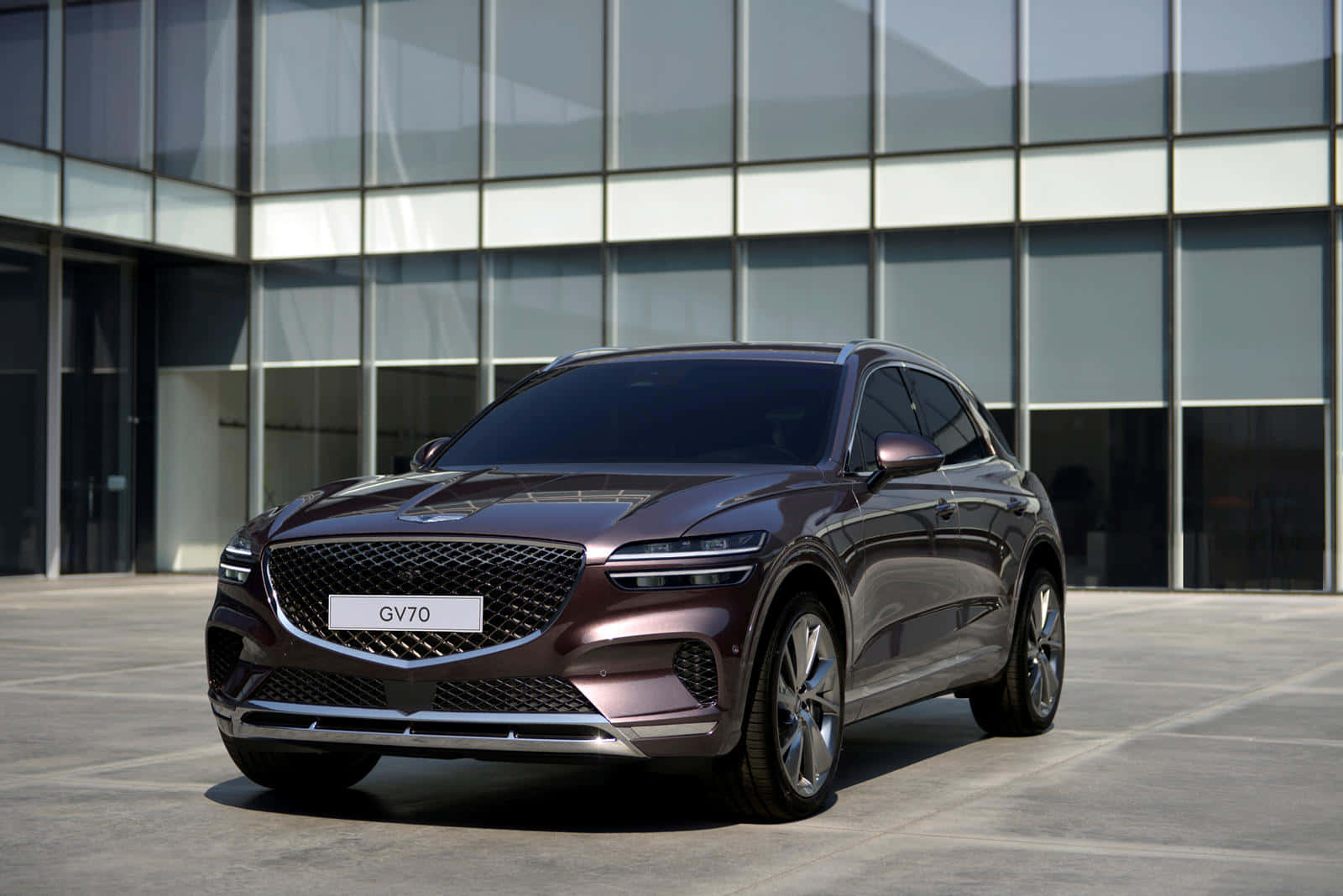 Sleek and Luxurious - The Genesis GV70 Sport SUV Wallpaper