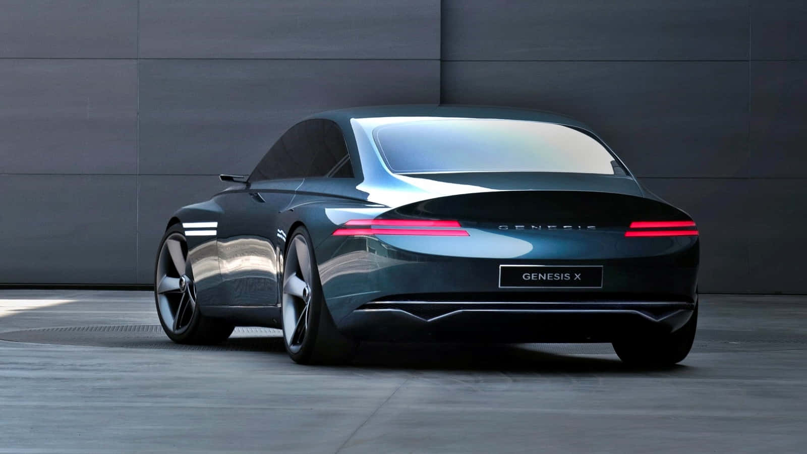 Sleek Genesis X Concept Sports Car Showcased in Dynamic Environment Wallpaper