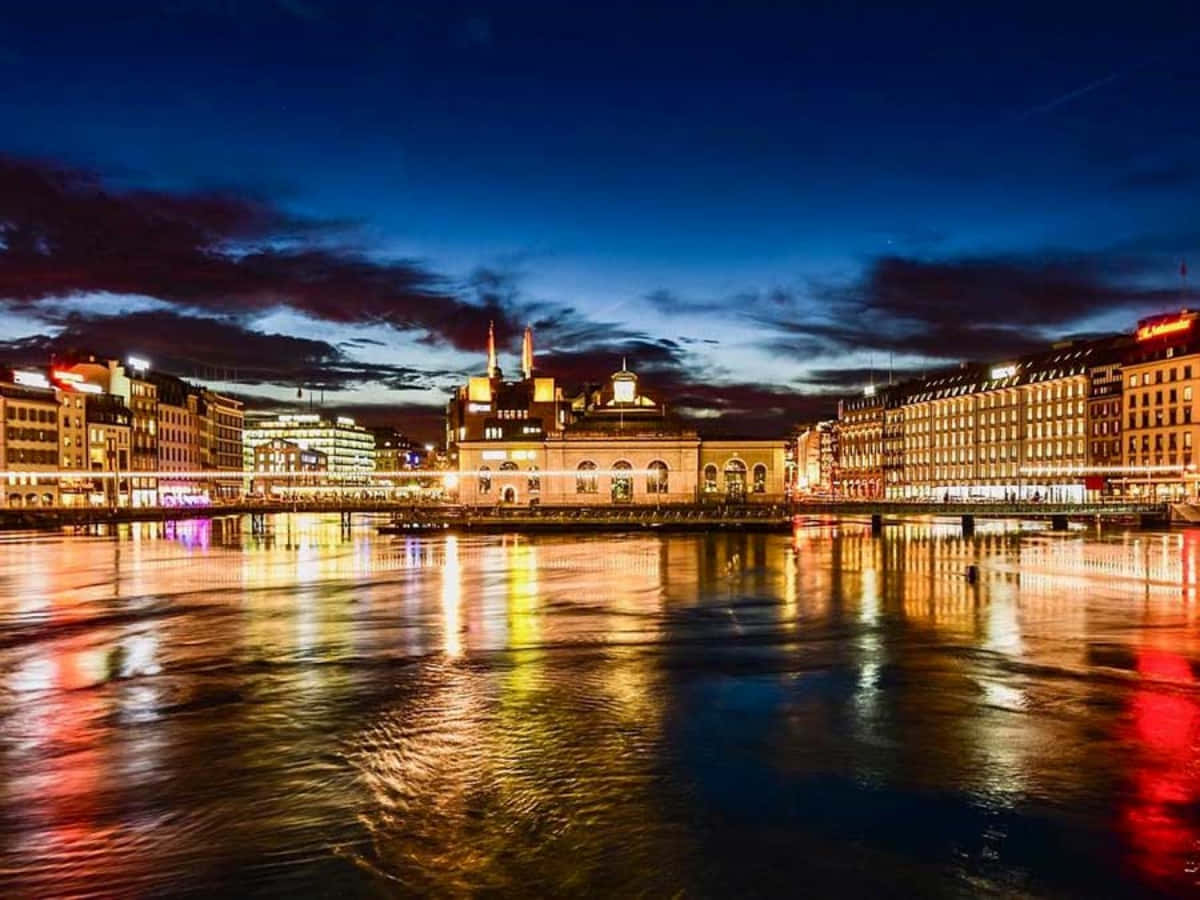 Geneva Nighttime Waterfront Reflections Wallpaper