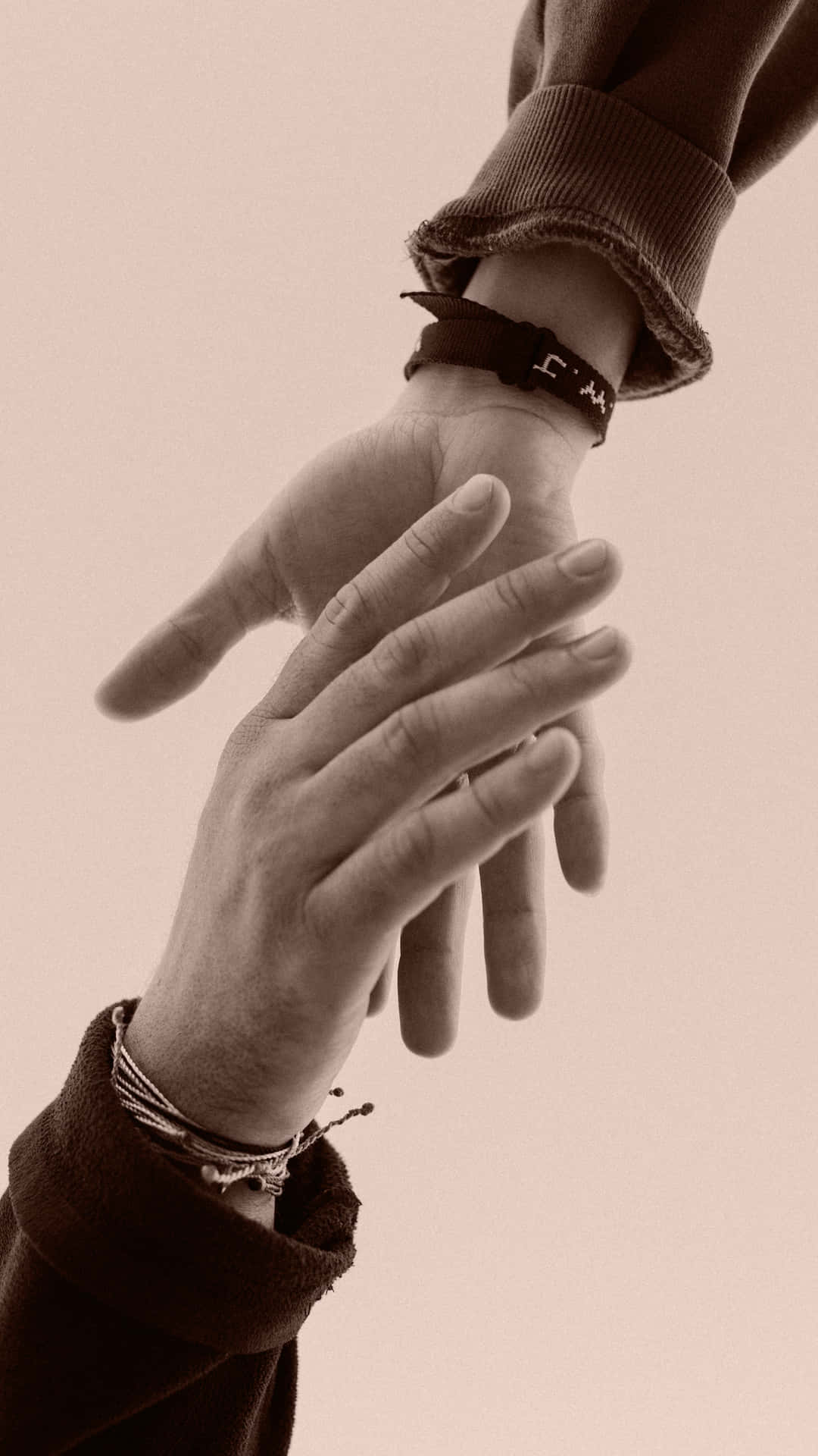Gentle Handshake With Bracelets Wallpaper