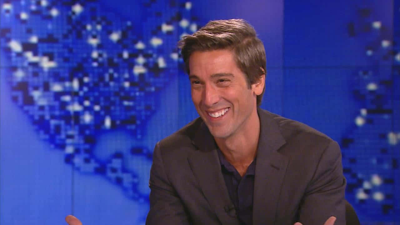 Anchor David Muir with his captivating smile Wallpaper