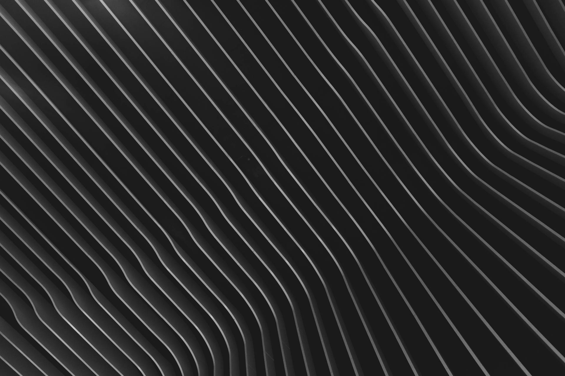 Patróngeométrico De Líneas En Pantalla Negra 4k. Fondo de pantalla