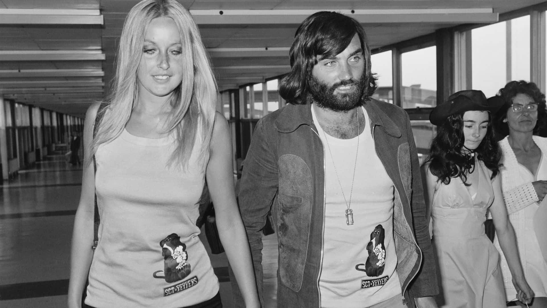 George Best With Mary Stavin Greyscale Wallpaper