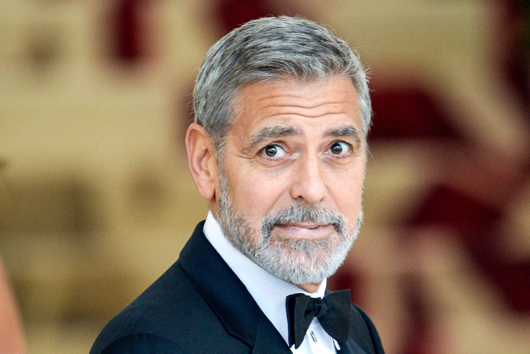 Captivating portrait of George Clooney Wallpaper