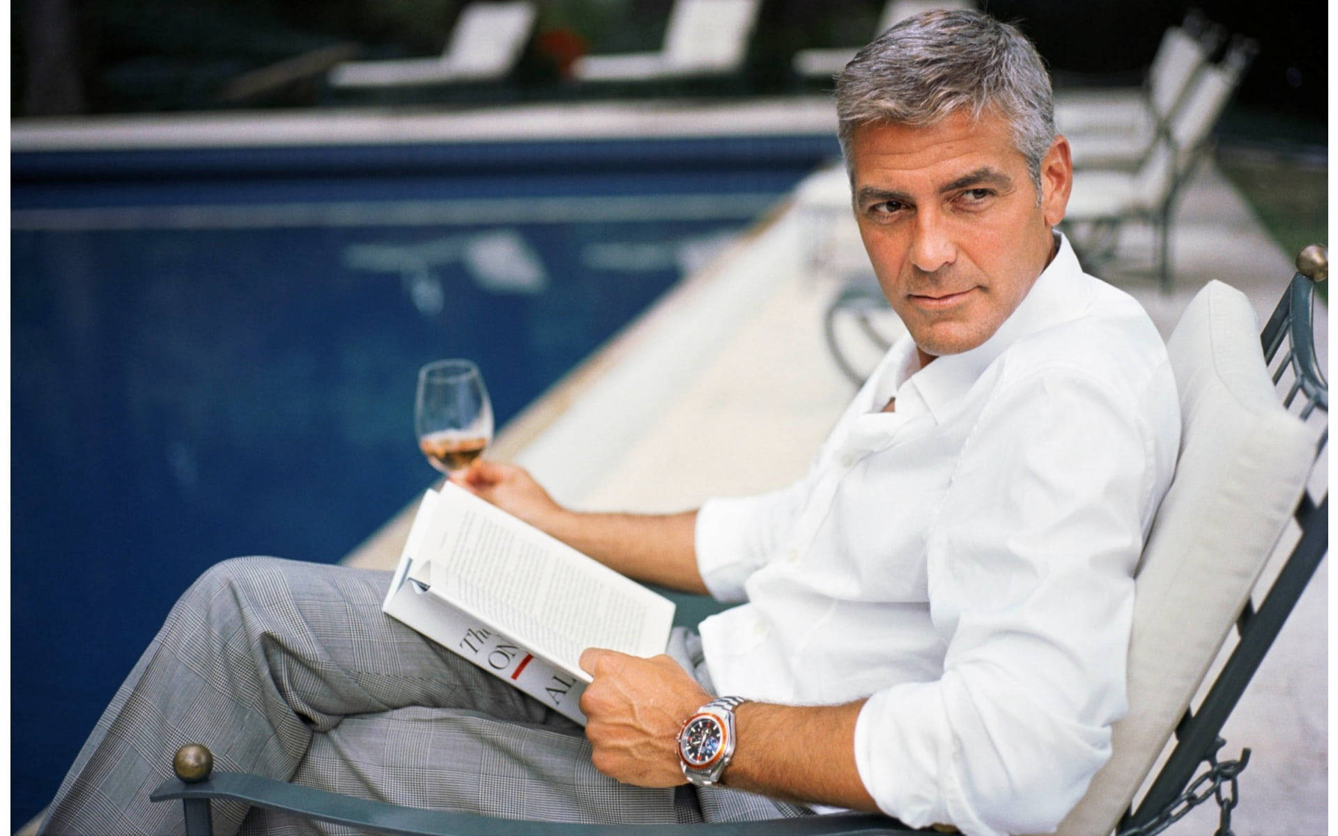 George Clooney amerikansk producent med skygge af et Hollywood-smil på dit skrivebord. Wallpaper