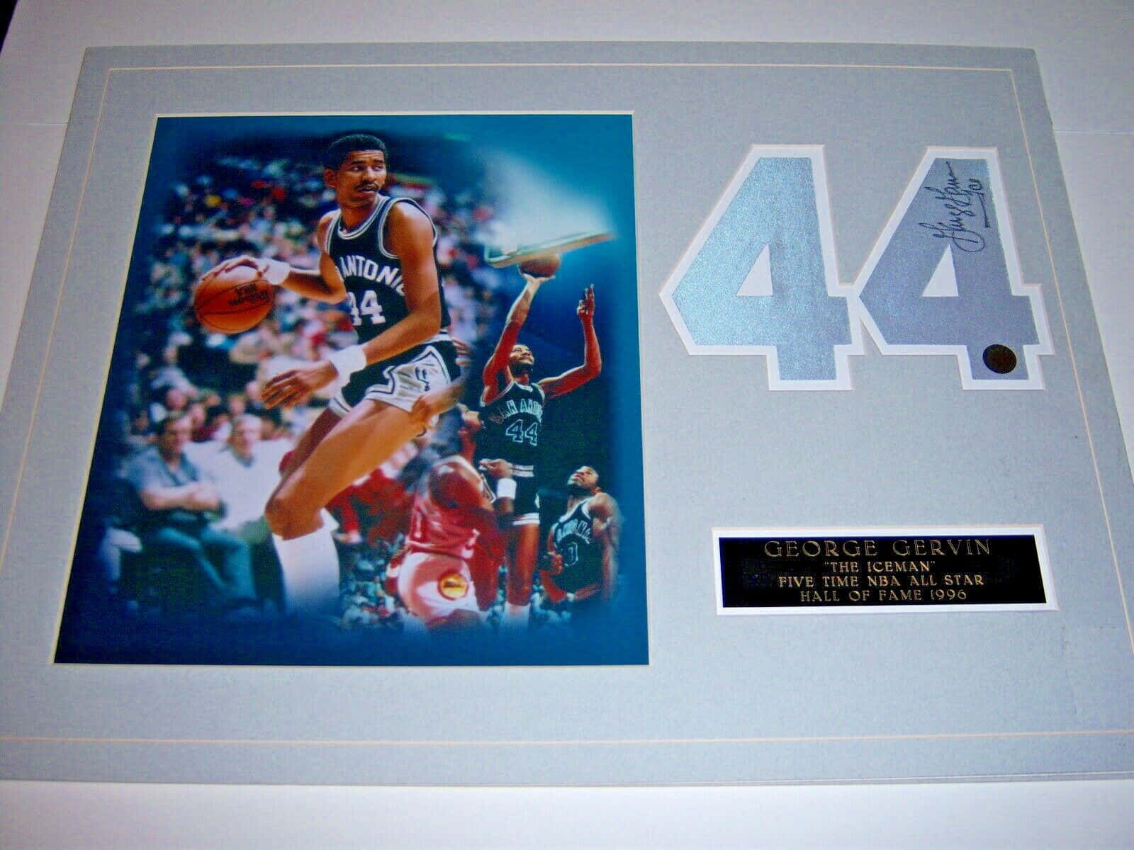 George Gervin Shooting A Basketball Framed Memorabilia Wallpaper