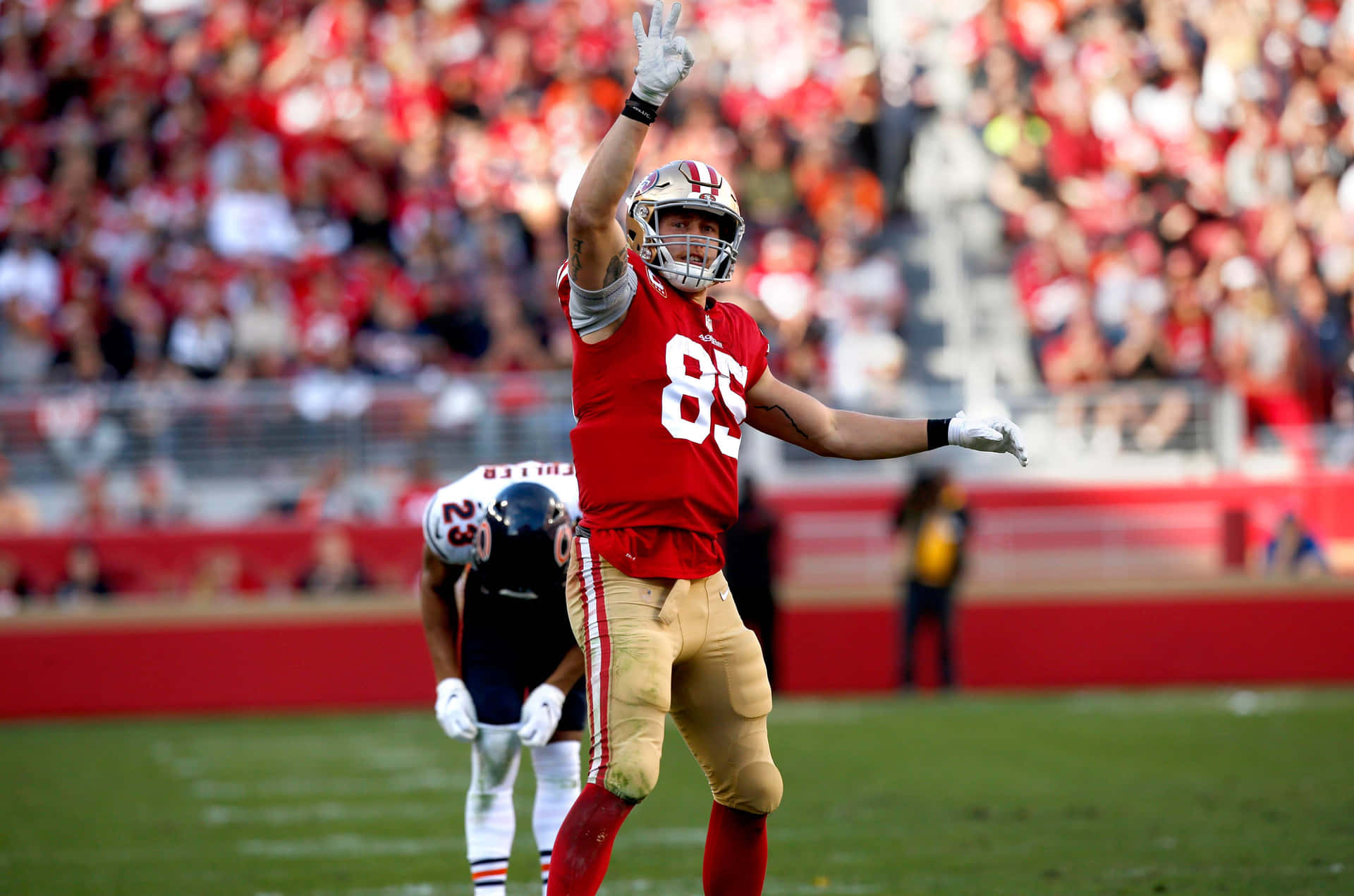 George Kittle Catching a Pass Wallpaper