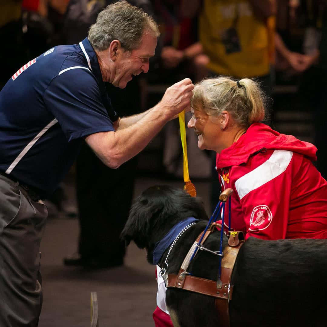 George W. Bush Awarding An Old Lady Wallpaper