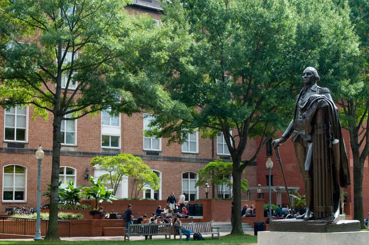 George Washington University Statue Surrounded By Trees Picture